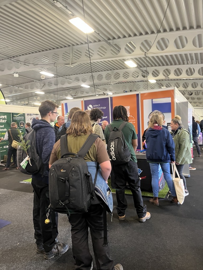 National Fruit Show 2025 with Select Technology - a giant queue of people visiting Select Technology to find out about our IT support services
