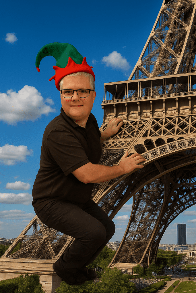 You found Nick Ellis! Our AI and Innovation Lead, climbing the Eiffel Tower!